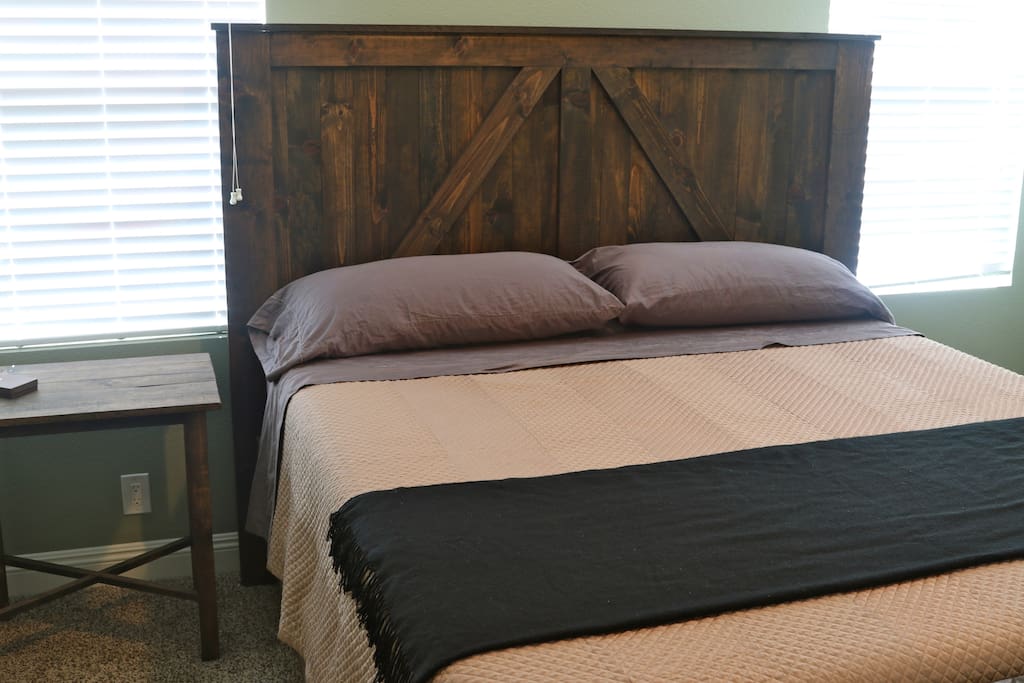 Master bedroom with CA king memory foam mattress.