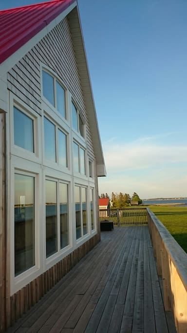 View along the wrap around deck - perfect for enjoying summer weather.