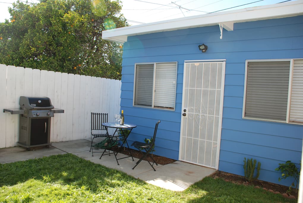 Front entry to cottage with BBQ