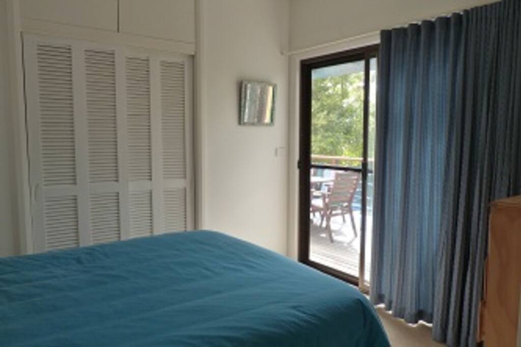 Master Bedroom of cottage with balcony access