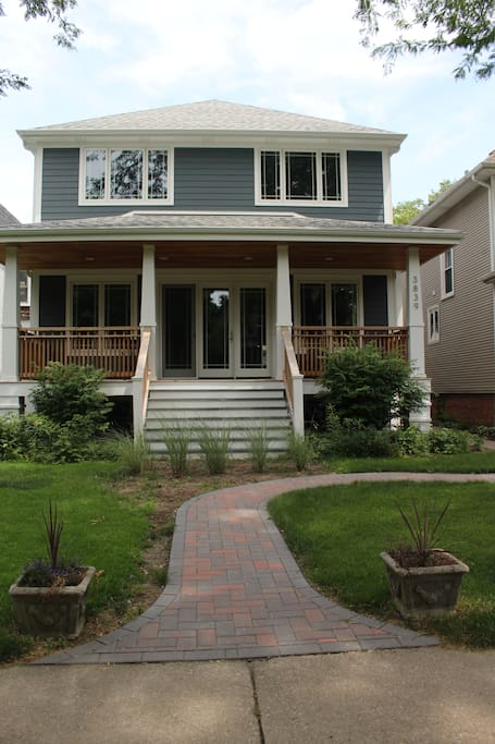 Bungalow 2.0. Historic Chicago bungalow re-imagined as open space design, right off the Blue Line