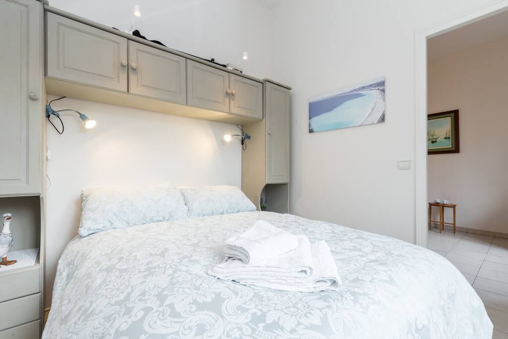 bedroom storage and bedside lighting