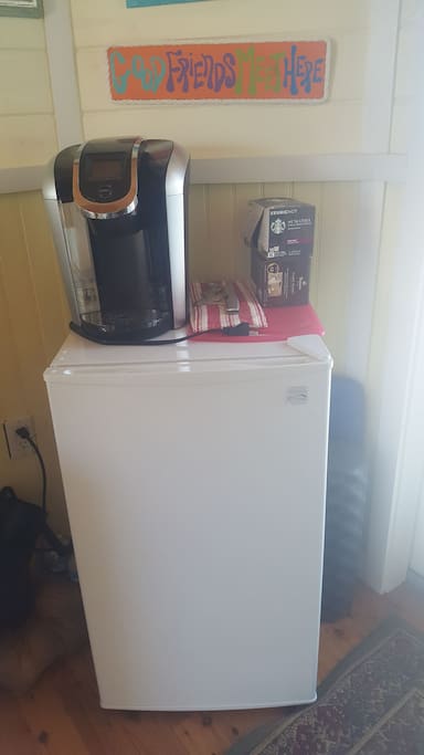 Comes equipped with a mini fridge, coffee maker, & microwave