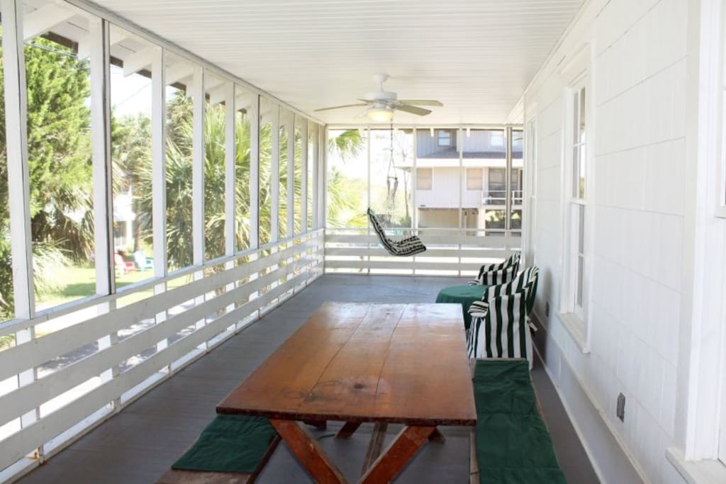 Large wrap-around screened porch to enjoy coffee, cocktails, friends and family
