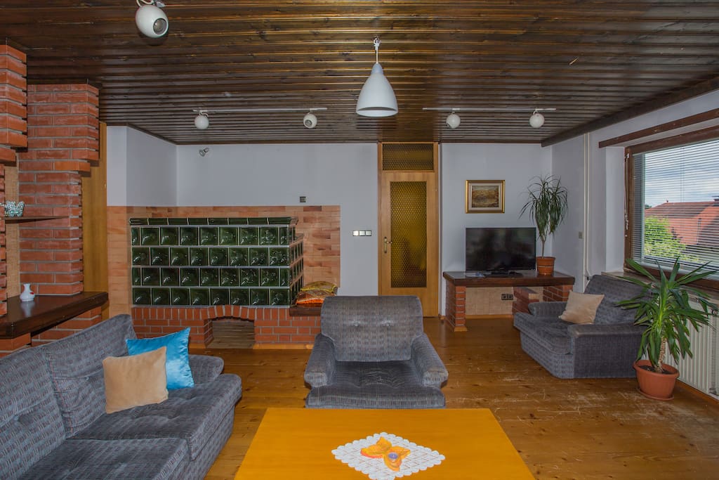 Big living room with a traditional Slovenian oven.