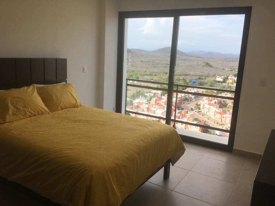 2nd bedroom. Balcony with city/ocean views.