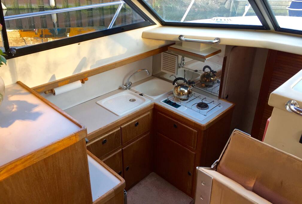 Kitchen with H/C water, fridge, gas, mains power, all utensils, glasses etc.