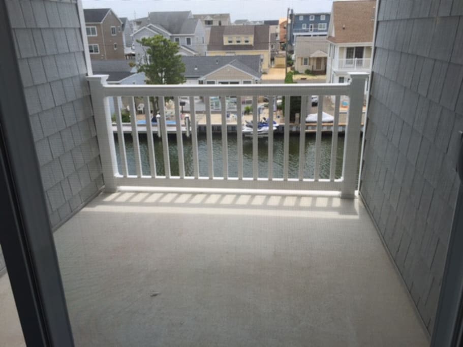 Second Floor covered deck overlooking lagoon