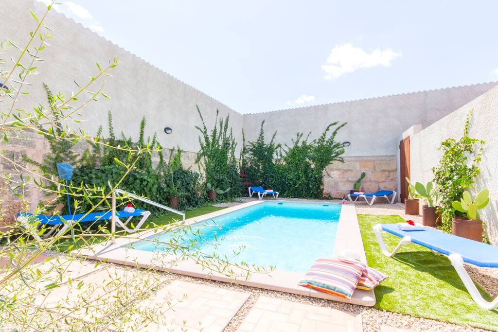Pool with sun beds