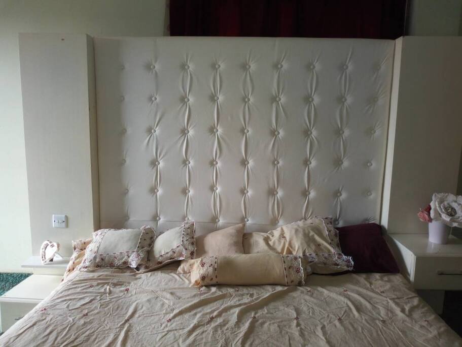 King-size bed; in the master bedroom