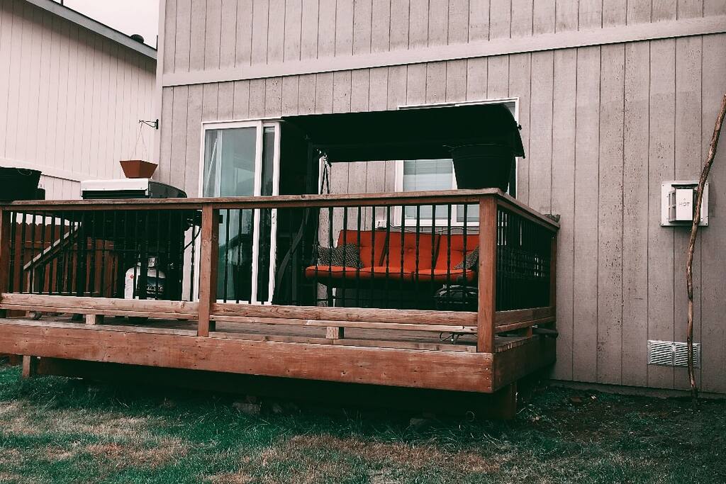 View of porch from the backyard