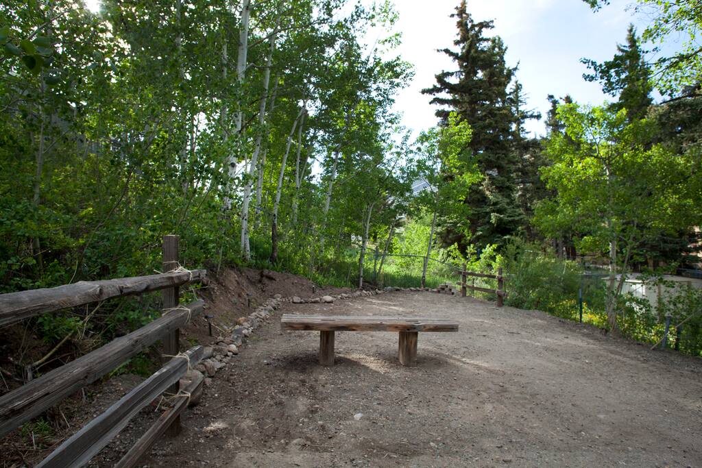 Enjoy the backyard, while you listen to sounds of a rushing creek and enjoy the sights of distant mountains.