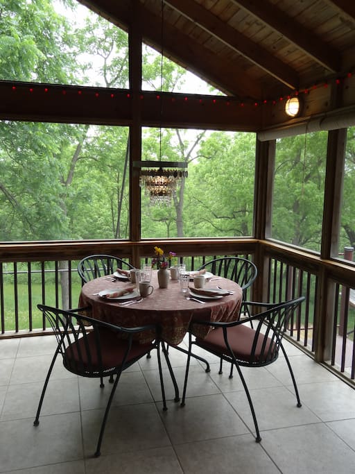 Enjoy meals on your private elevated screen porch.