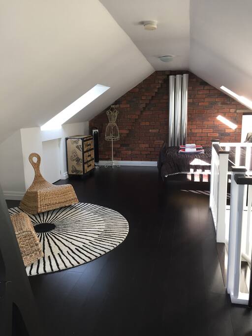 Another view of upper bedroom/seating area