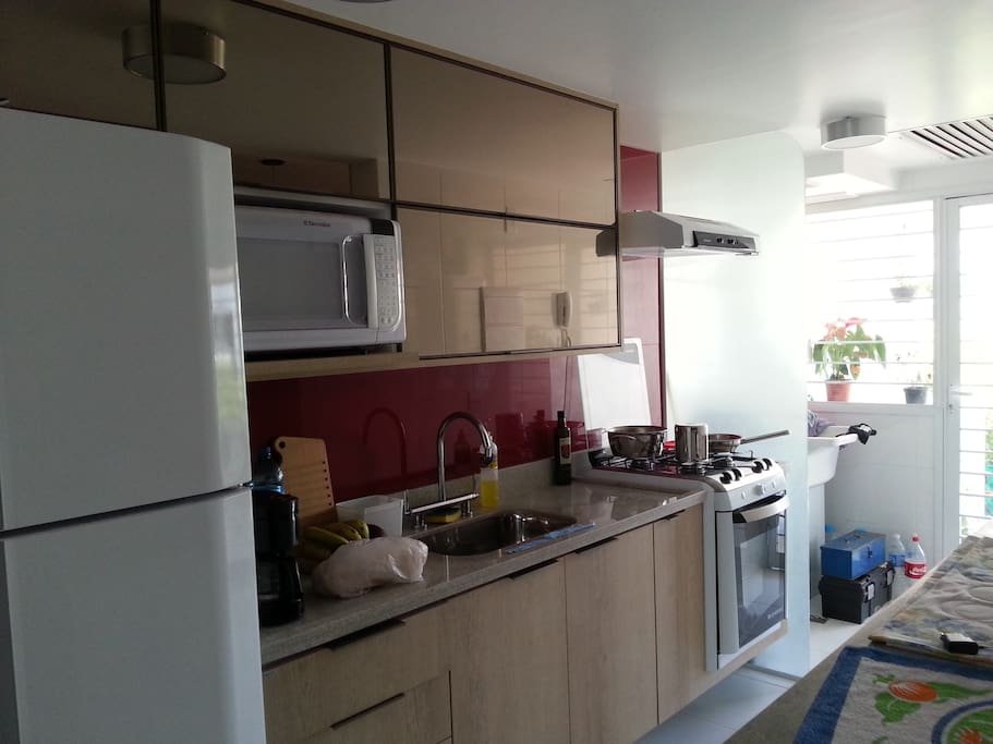 Detalhe da cozinha e área de serviço,