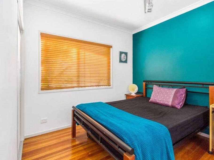 Bedroom2- queen sized bed with adjoining shared bathroom/toilet