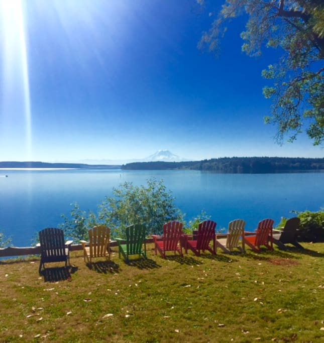 A rainbow of Adirondack chairs awaits you.