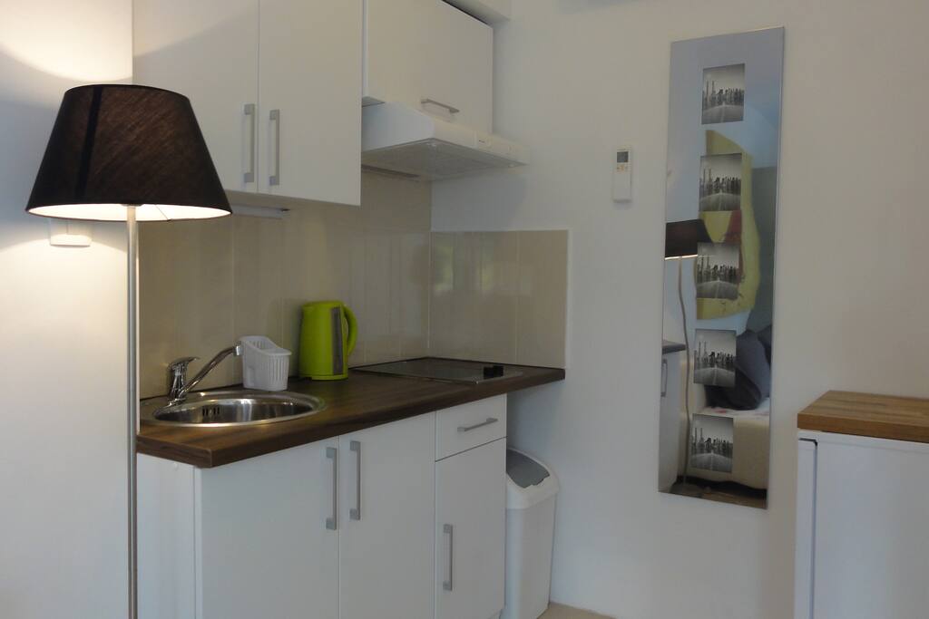 Kitchen has all you need for preparing delicious food. Water heater and expresso machine inc.