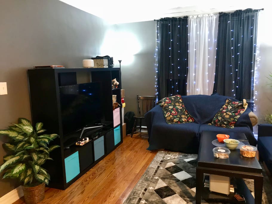 living room has TV and Apple TV with Netflix and Amazon Prime video.