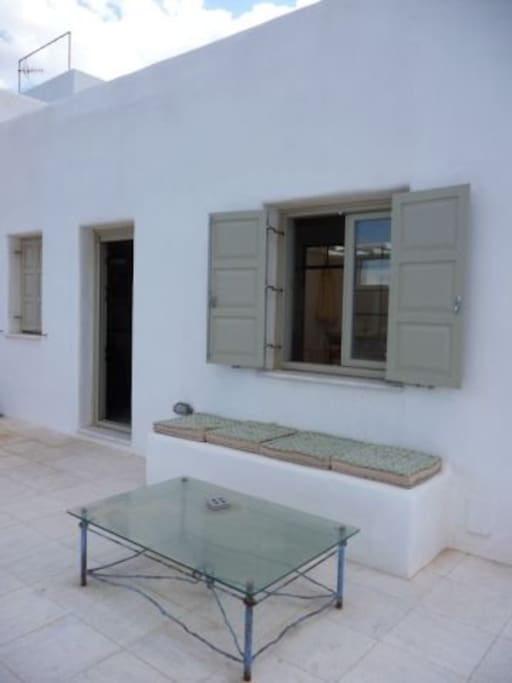 The veranda has plenty of lounge area.