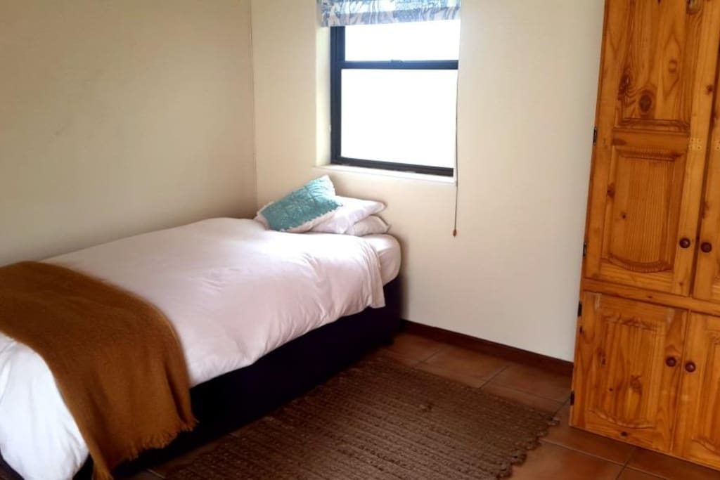 Single bed in common room
