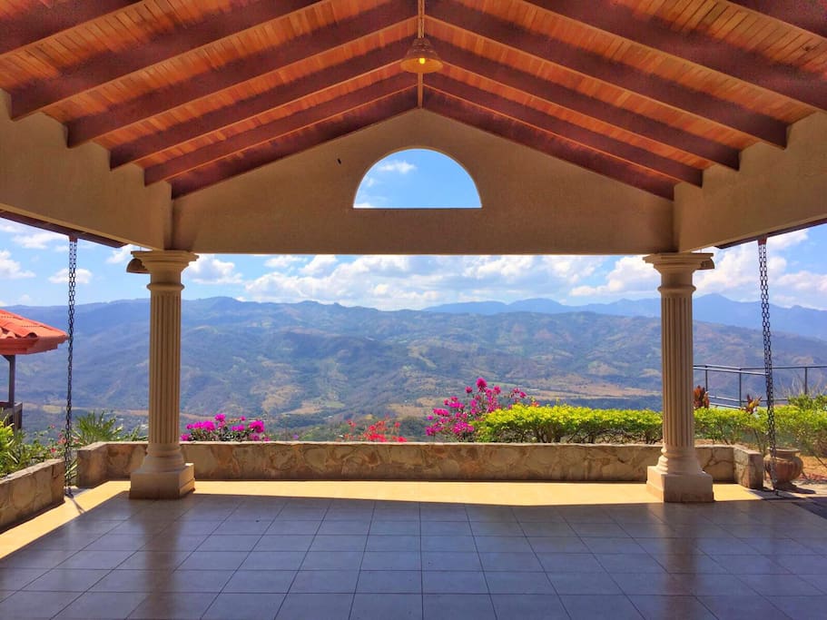 Front door looking out to magnificent views and beautiful flowers.