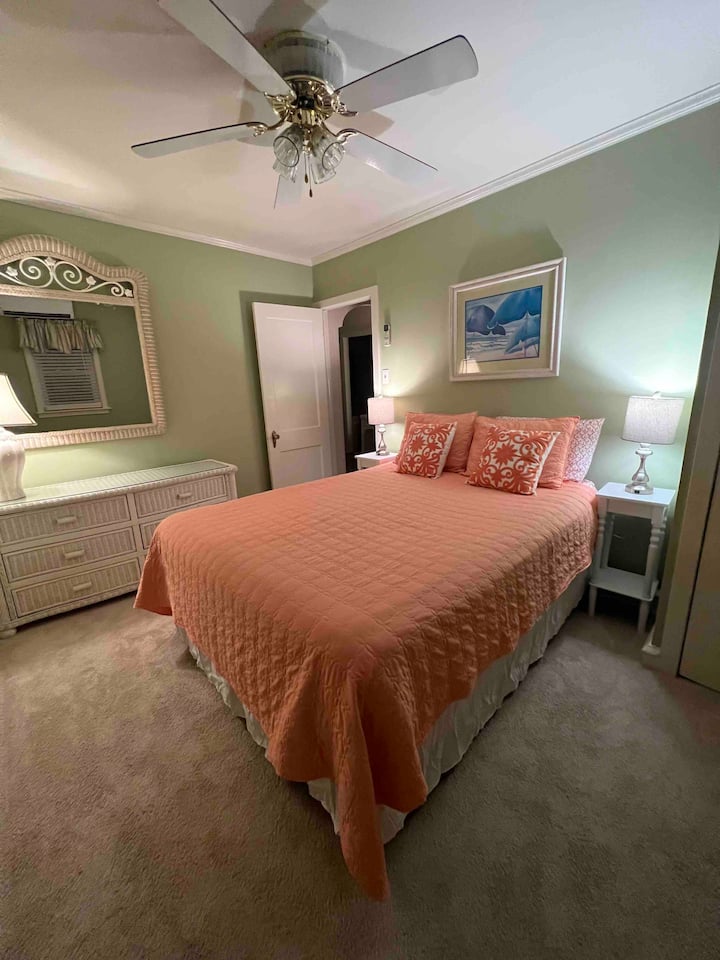 Front bedroom offers a queen size bed. Fall asleep to the sounds of the ocean crashing on the beach. 