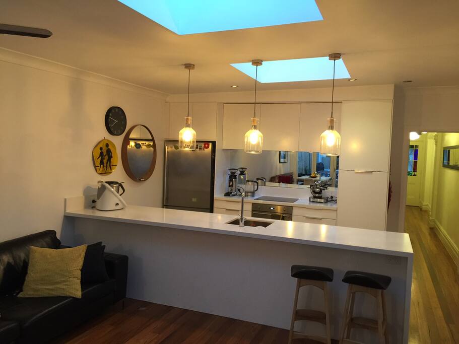 The kitchen opening to the living area