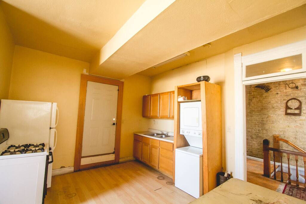 Fully functional kitchen opening to private deck. Of course you're 2 floors above an award-winning restaurant.
