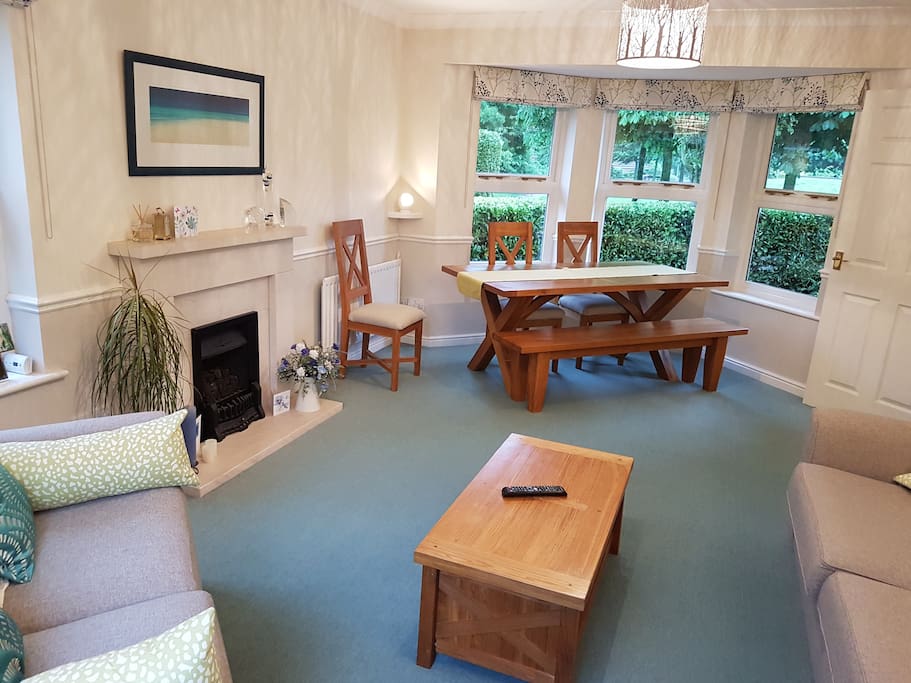 Additional dining space in living room.
