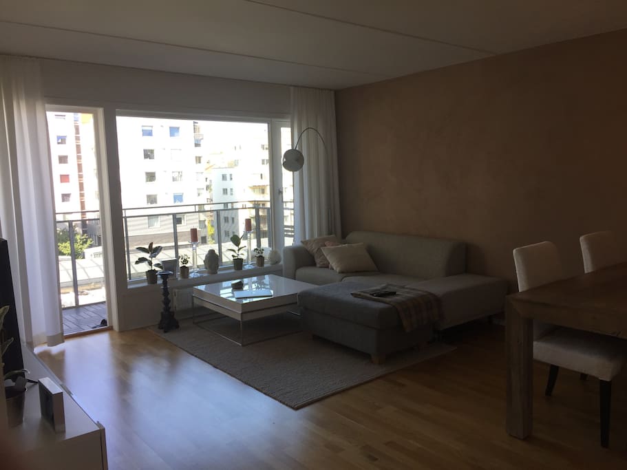 Living room with entrance to balcony