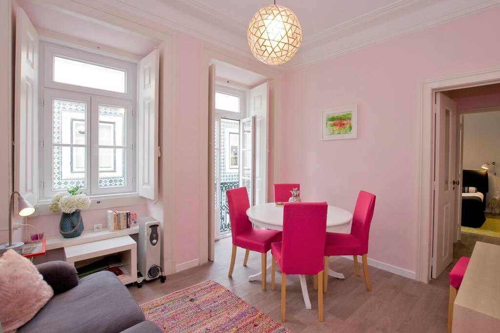 Comfortable living and dining room with nice balcony