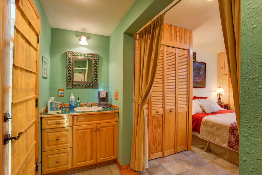 Queen Bed and Bathroom with Shower