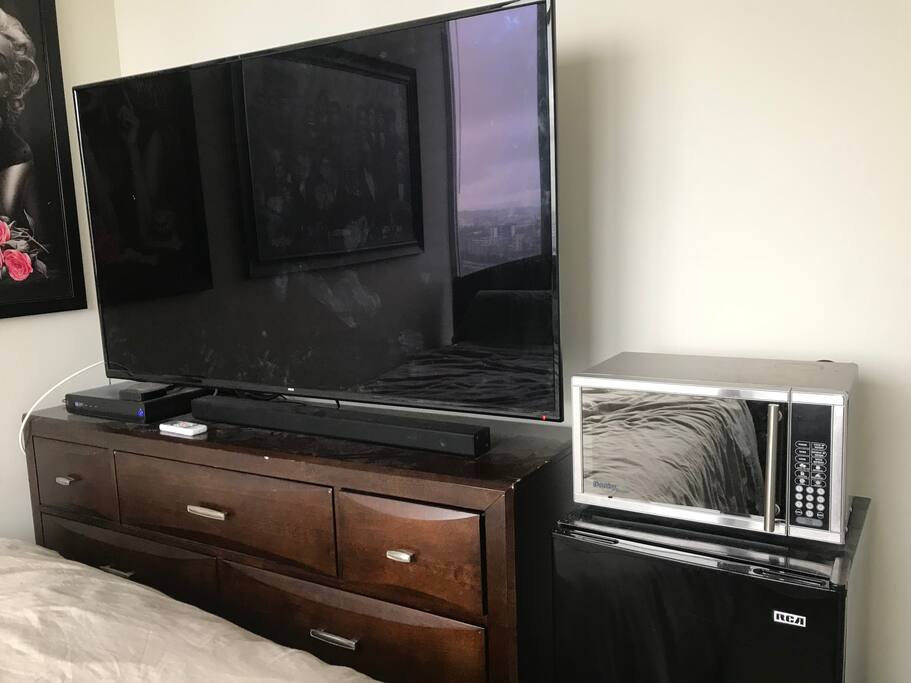 Master bed room with 70inch TV 4K