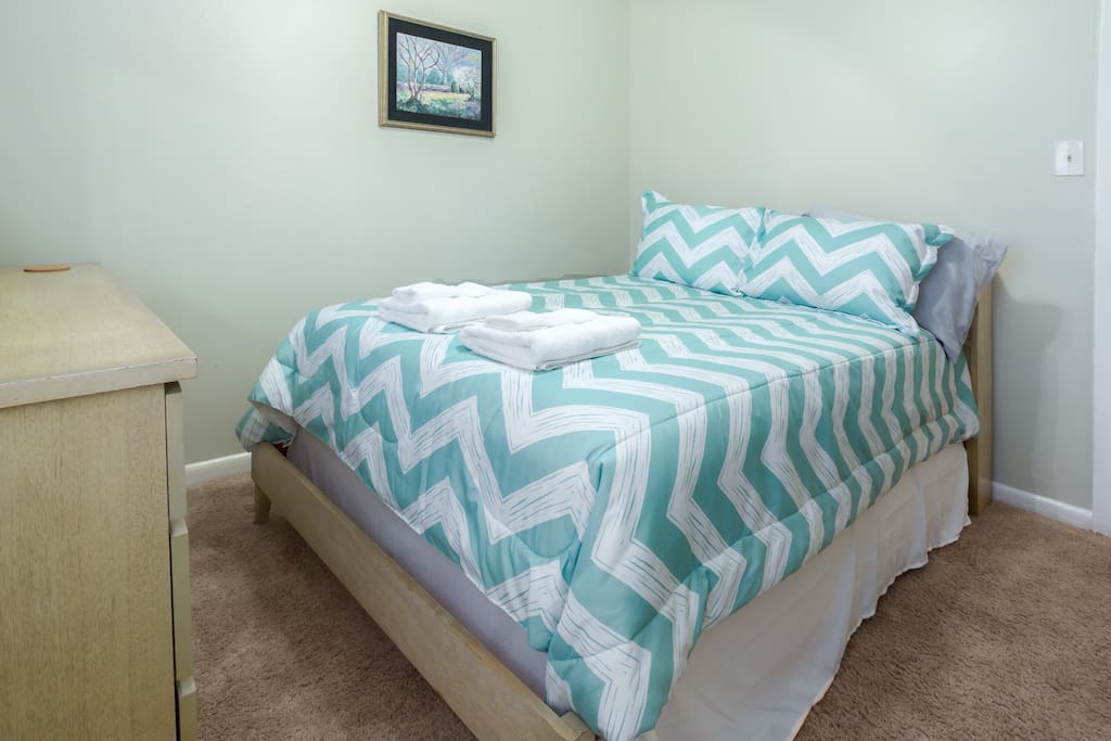 Full bed with foam topper, plenty of dresser room! Each room has hypoallergenic sheet/mattress protectors and fresh linens and towels