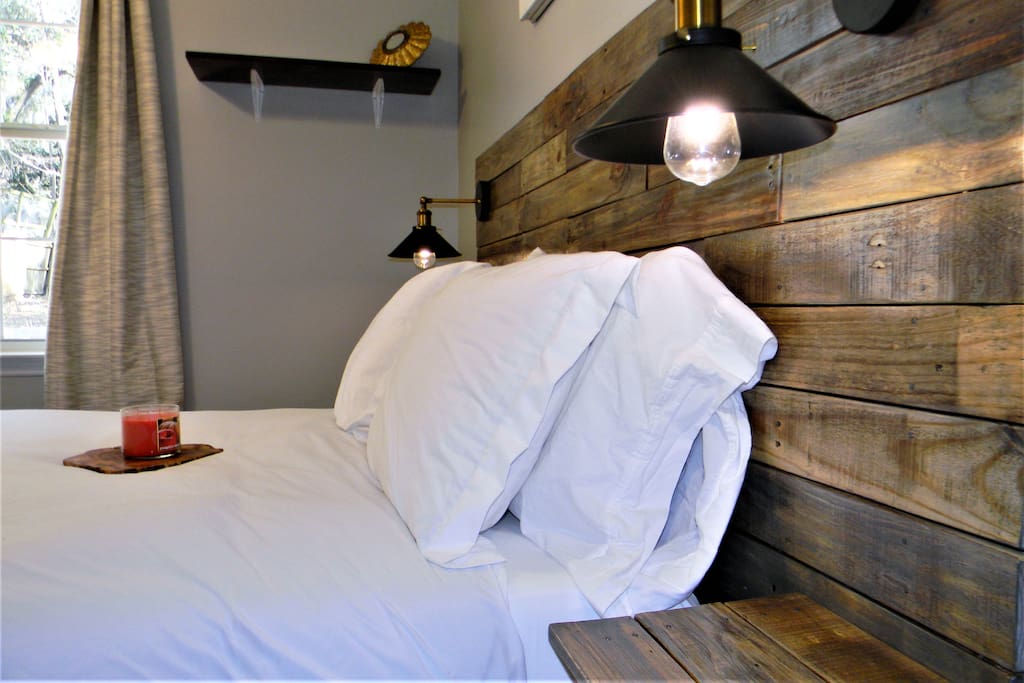 Rest peacefully in your reclaimed hardwood queen bed with memory foam mattress