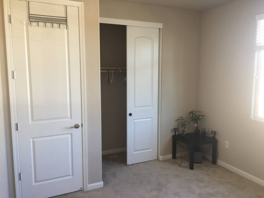 Closet and Bose Bluetooth speakers as part of the room