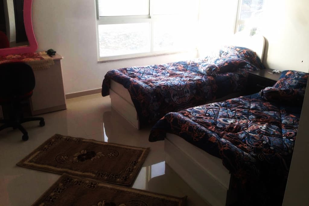 relaxing beds with a good view outside, very quit and there is smoothing iron in the room with a table
good night :)