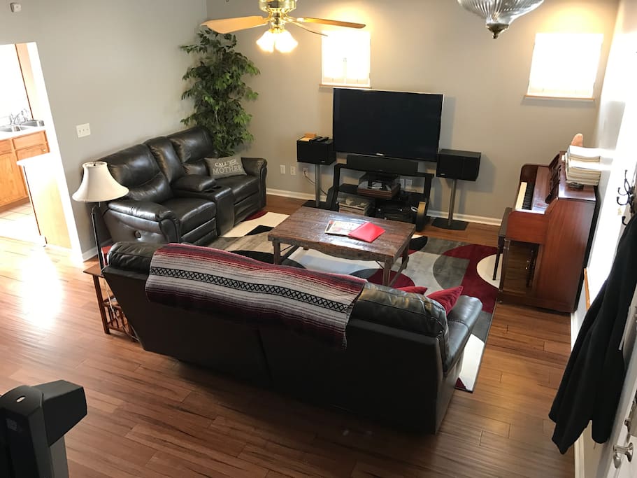 Both of the couches are leather reclining.