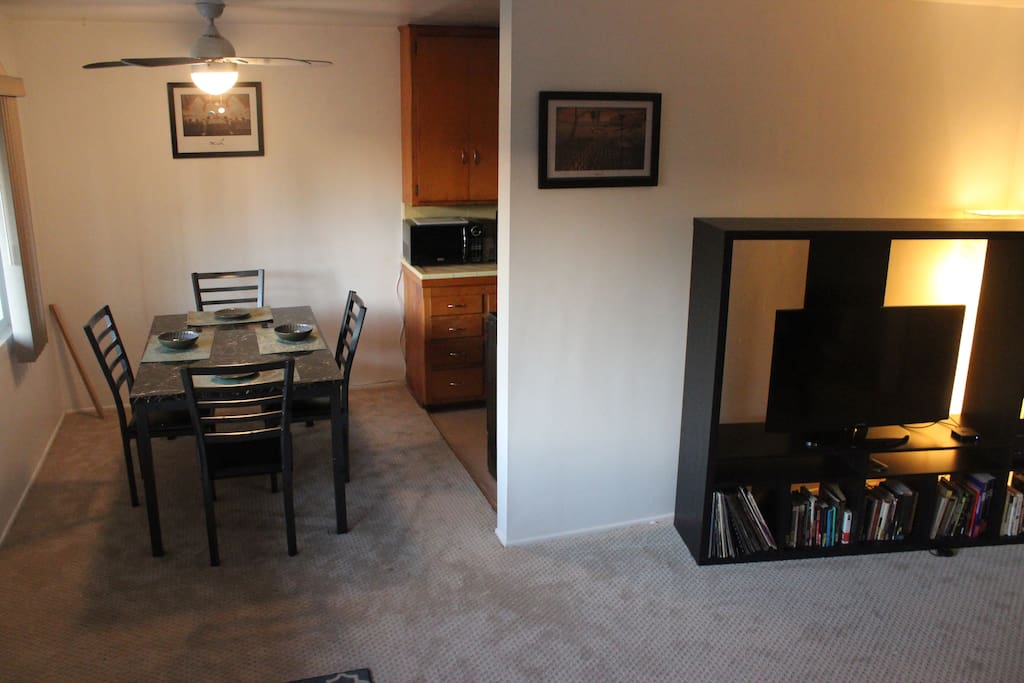 Elevated view of dining table and living room.