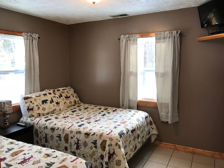 Bedroom features Twin/Full  Bed with Television and Large Closet