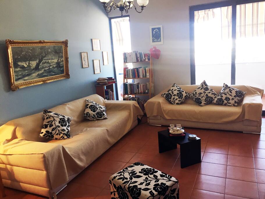 The living room is spacious, full of light and very comfortable, to hang out, eat a nice dinner or just relax.