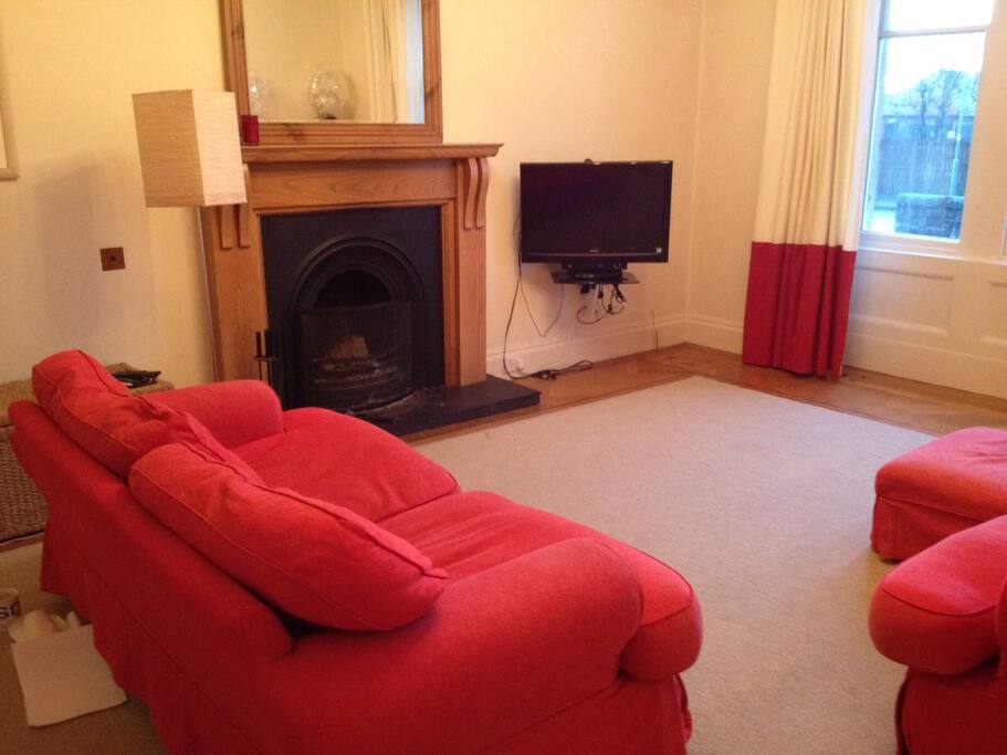 Private sitting room with cable TV and internet access.