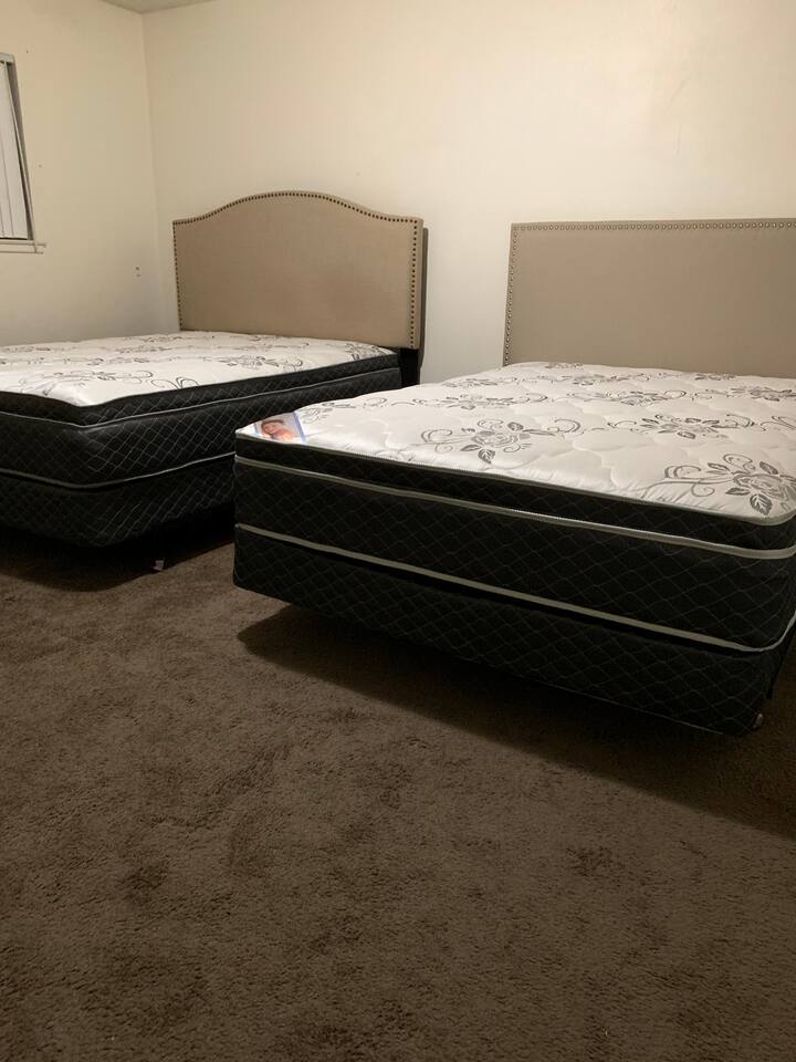 This picture is without bedding so you can see we have invested in your comfort. Every bed is a custom pillow top mattress.