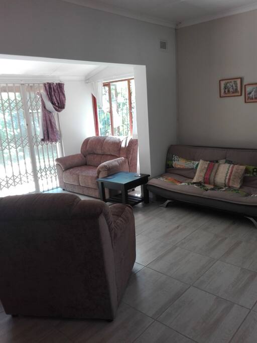 Sun room, walking out onto back garden.