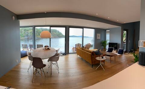 New cabin on the water's edge on idyllic Sandøya