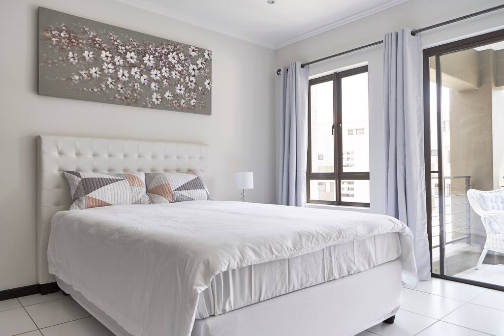 Spacious queen extra length bed.
