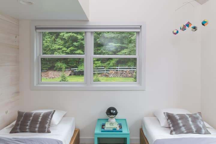 Apartment bedroom #2, two twin beds. Minimal Scandinavian style.