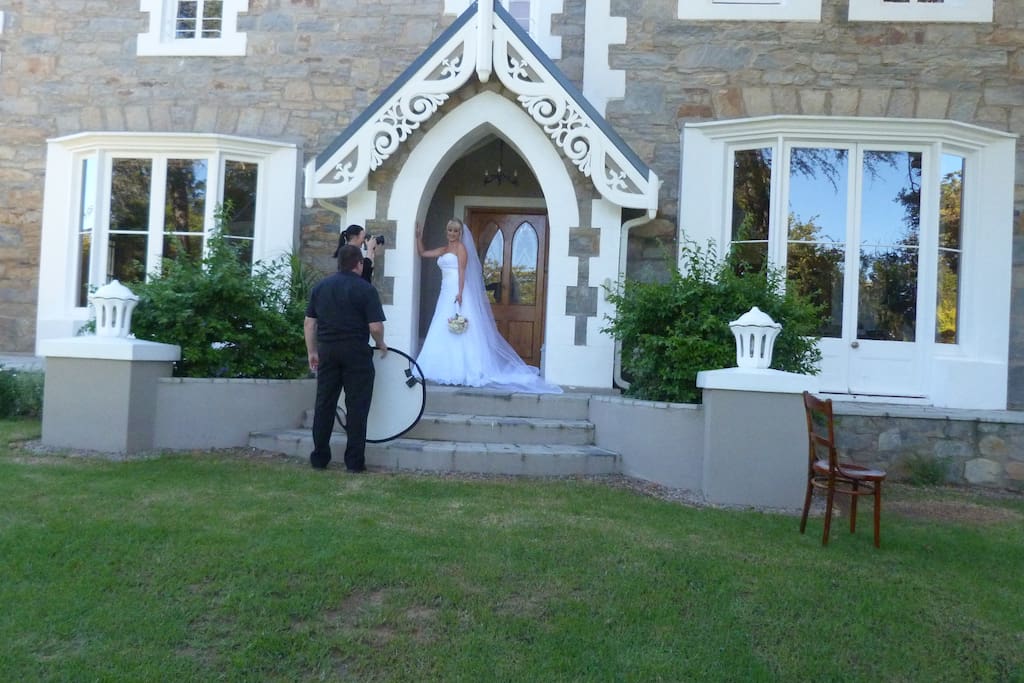 Wedding photo in front of main house front door