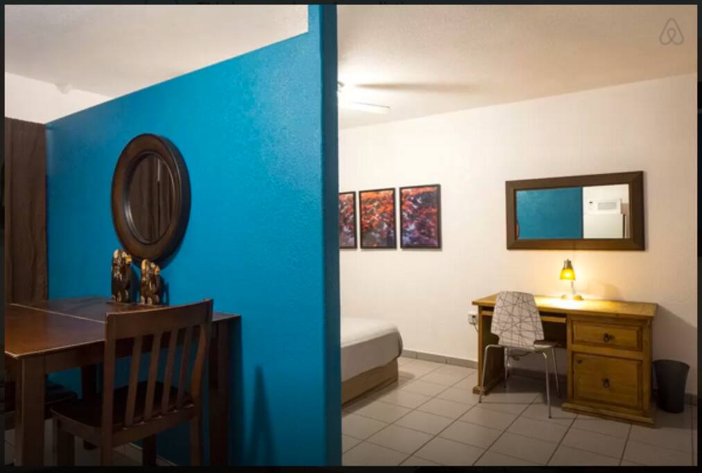 View of division between dining area and bedroom